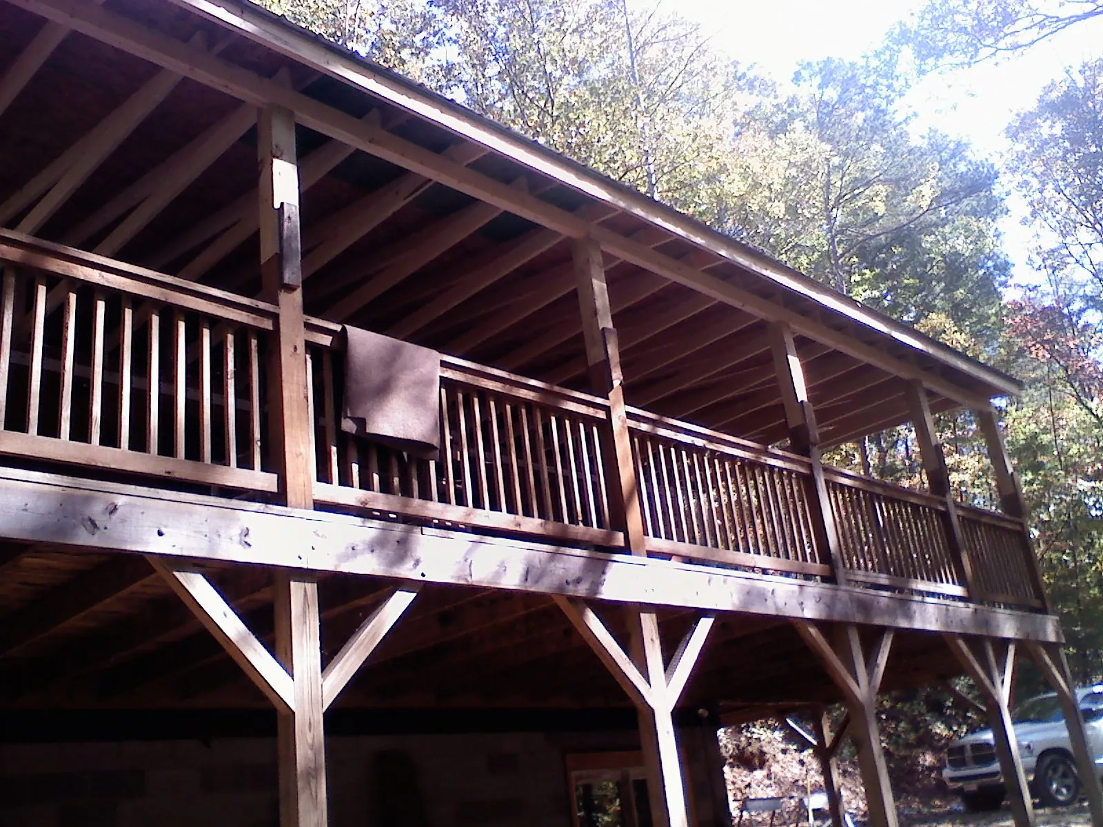 Timber framing under a new elevated porch and deck — Roof Leak Repair in Rexburg by Roofing Brothers